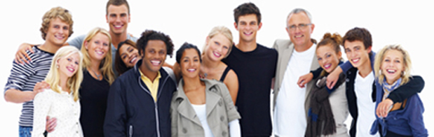 Group of smiling friends standing against white background